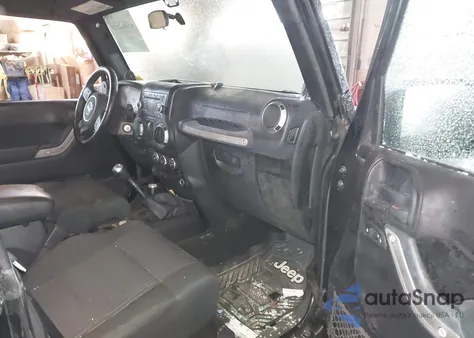 2011 Jeep Wrangler Sport z USA, uszkodzony, nr VIN 1J4AA2D15BL577182